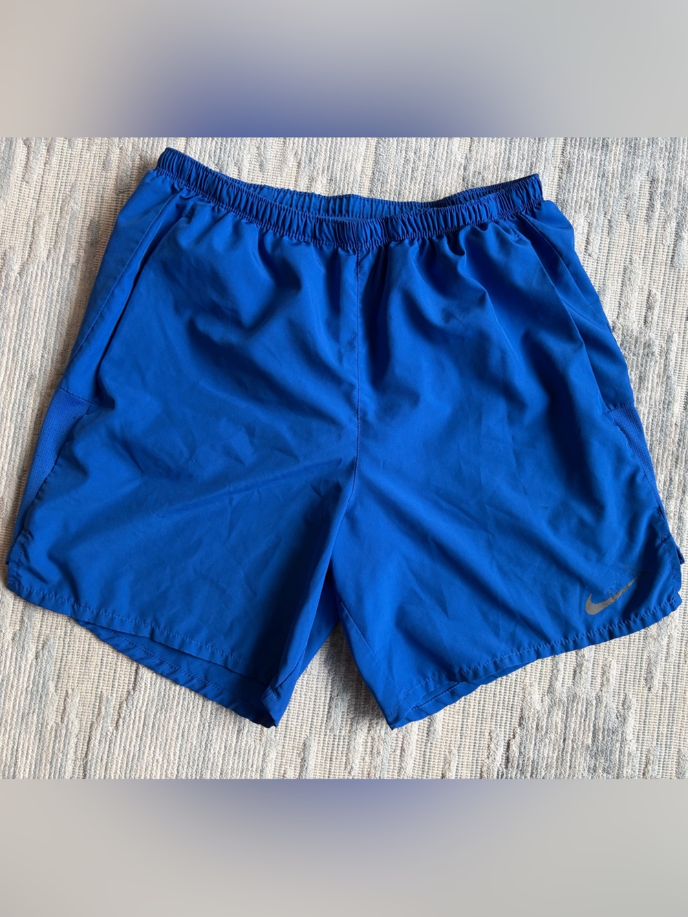 Nike Men’s Royal Blue Athletic Shorts with grey Swoosh
